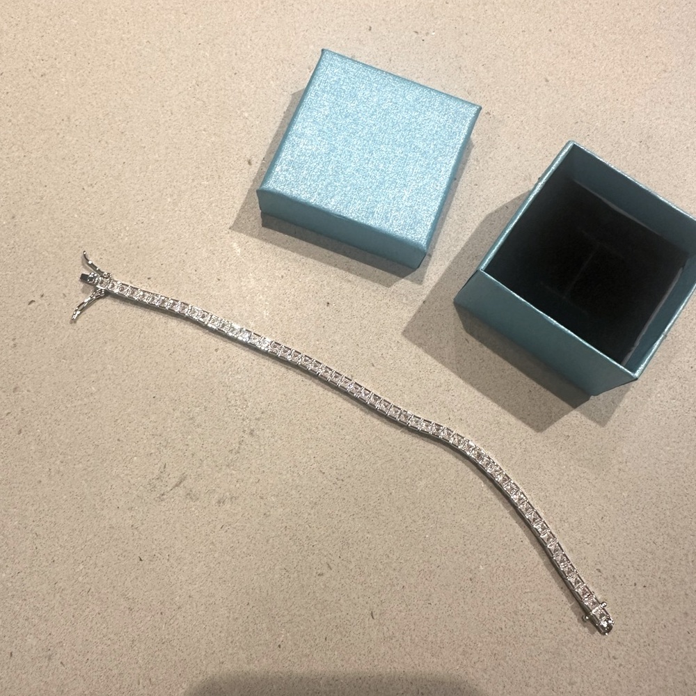 Fake diamond tennis bracelet, never worn